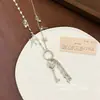 Colar com Pingente de Coração e Borla Estilo Menina Doce Cool Picante High-End Nova Tendência Fashionável Temperamento Acessórios de Colar Longo Feminino