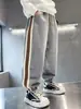 Pantalones de Estilo Coreano para Niños Primavera y Otoño 2023 Nuevos Pantalones Elegantes para Niños Grandes Medianos Pantalones Casuales con Puño Moda Calle Tendencia