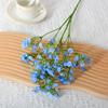 Pequeña flor artificial natural fresca, individual, pequeña gypsophila floral, novia sosteniendo un ramo, a juego con las decoraciones florales de la mesa.