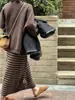 Falda Larga de Rayas Pesada Retro de Gama Alta Ámbar Dorado Otoño Nuevo Dongdaemun Corea del Sur
