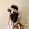 Sombrero de pescador de ala extragrande de algodón y lino para mujer, nuevo estilo primavera/verano, moderno japonés, elegante francés, protección solar, sombrero artístico para viajar