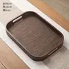 Bandeja de té casera para teteras, tazas de té, frutas, plato de postre de alta gama, posavasos tejido de bambú con asa octogonal