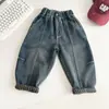 Valle del Viento 2026 Otoño Nuevos Jeans Sueltos Elegantes y Versátiles para Niños Pantalones Largos Retro con Dobladillo de Personalidad para Niños