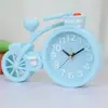 Reloj coreano al por mayor color caramelo superficie de reloj digital estéreo 3D grande bicicleta despertador para estudiante suministro de 10 yuanes