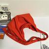 Bolso de lona de color sólido de estilo japonés para mujer, bolso de tela de gran capacidad para estudiantes, bolso cruzado informal de hombro a la moda que combina con todo.