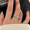 Design sentindo três círculos ao redor do anel de zircônia feminino nicho personalidade única moda temperamento tendência anel versátil anel anel