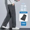 Venta al por mayor de jeans gruesos con forro polar para otoño e invierno para hombre, pantalones de pierna ancha de cintura alta, pantalones casuales de negocios rectos holgados y elásticos para hombre