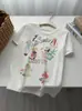 Camiseta de Algodón con Estampado de Dibujos Animados de Copos de Nieve, Cuello Redondo, Manga Corta para Mujer, Nueva Colección Verano 26, Corte Ajustado, Top Versátil, Estilo Coreano