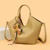 Elegante y estiloso bolso de mano con colgante de poni para mujer, nuevo modelo 2026, adecuado para ir al trabajo, bolso de hombro moderno y versátil, bolso cruzado