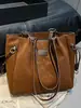 Bolsa de mano casual Shuai Mijia para mujer, gran capacidad, nueva moda 2026, bolso de hombro, bolso de mano casual para el trabajo con textura