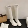 Botas de punta fina 2026 Otoño/Invierno botas largas Diseño de botas elásticas Nicho Versátil Nuevo Suela plana Europeo y Americano Botas Mango Mujer