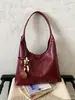 Bolso de Lona Retro de Gran Capacidad para Salir y Viajar 2026 Nuevo Elegante Casual Color Sólido Debajo del Brazo Diseño de Moda Bolso de Hombro