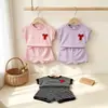Nueva ropa para niñas de comercio exterior transfronterizo: conjunto de camiseta de rayas con top de lazo y shorts, conjunto sencillo de dos piezas de manga corta para niños