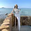 Traje Retro Francés de Lunares con Top Ajustado de Cuello Halter y Falda de Cintura Alta que se Ajusta a la Cadera Conjunto de Vestido de Dos Piezas