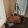 Bolsa de axila feminina de alta qualidade, luxo leve, nicho, novo modelo de verão 2026, ultra-popular, bolsa de ombro tote executiva requintada