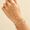 Set de Pulsera de Dedo Conectada de Estrella y Luna Europea y Americana Cadena de Dedo con Colgante de Estrella y Luna Doradas Joyería de Mano Bohemio en Capas