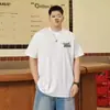 80-300 jin estilo Hong Kong tamanho plus size manga curta camiseta masculina verão novo solta versátil jovem meia-manga