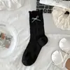 Calcetines de media pantorrilla con lazo para mujer Calcetines japoneses dulces de media pantorrilla Primavera y Verano Delgados de malla hueca Borde enrollado Calcetines con volantes