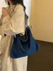 Bolsos de mezclilla al por mayor para exportación, nuevos diseños elegantes para mujer, gran capacidad, adecuados para el trabajo, se pueden llevar debajo del brazo o como bolso de hombro