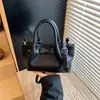 Bolso Cubo de Mano Casual Simple de Moda para Mujer 2025 Verano Nuevo Estilo de Gama Alta Elegante Moderno Bolso de Hombro Cruzado