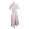 Nuevo vestido de punto calado de verano con cuello redondo, sin mangas, patrón jacquard ondulado, ceñido a la cintura, dobladillo amplio, vestido de longitud media, moda dulce para mujer