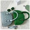 Popular bolsa de concha 2026, nuevo bolso de hombro de moda, bolso de mujer para el trabajo, bolso floral de bordado de hueso para teléfono móvil, bolso cruzado para mujer