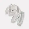 Conjunto Duas Peças Cachorrinho Novo Primavera 2026 para Bebês e Crianças Pequenas Conjunto de Moletom e Calça de Moletom Estiloso Versão Coreana Desenho Animado