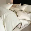 Conjunto de quatro peças em jacquard de cetim 100% algodão classe A lençol de baixo com elástico lençol de cima capa de edredom roupa de cama de luxo leve para todas as estações