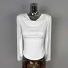 Ropa de mujer de comercio exterior de Dongdaemun, Corea: conjunto de dos piezas: top sin mangas versátil, adelgazante, sexy, femenino + cárdigan de manga larga