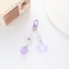 Novo chaveiro de pingente com borla de sino, estrela de cinco pontas oca brilhante, coração dupla face, acessórios para capa de fone de ouvido, bolsa