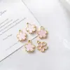 Nuevos Accesorios de Joyería Exquisitos Estilo Europeo y Americano Flor Hueca Flor de Ciruelo Pequeña Colgante para Collar Pendientes DIY