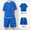 Conjunto de camiseta de verano para hombre con patrón de gofres, nuevo, traje deportivo de dos piezas con pantalones cortos de seda helada de manga corta para hombre, holgado y transpirable