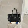Moda Outono 2026 Nova Bolsa de Mão Retrô de Grande Capacidade Nicho Luxo Leve Versátil para o Dia a Dia Ombro Único Transversal