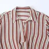 Moda Z brand 180 Europeo y Americano 32 transfronterizo cuello en V 24 diseño dobladillo suéter versátil rayado abullonado camisa ZA
