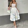 Marca Independente 2025 Nova Saia Cruzada Casual de Férias Estilo Doce e Fresco com Estampa Floral Decorada com Botões para o Verão