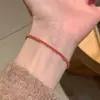 Pulseira Exquisita e Simples em Aço Titânio com Corda Vermelha Estilo Chinês Novo para Mulheres, Moda de Luxo Leve com Toque de Alta Qualidade, Pulseira Versátil Trançada Empilhável