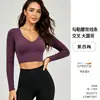 Nuevo top de yoga con espalda cruzada, manga larga y almohadilla para el pecho incorporada, hecho de spandex de alta elasticidad, adecuado para Pilates y fitness para mujeres