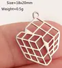Material de Acero Inoxidable Transfronterizo Personalizado Alien Cubo de Rubik Cohete Dinosaurio Guante de Boxeo Colgante de Dibujos Animados Listo para la Venta