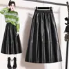 Ropa para mujer talla grande 2026 colección otoño nueva: elegante falda de cuero, falda midi de línea A de cintura alta, falda larga adelgazante para mujeres con curvas