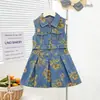 Vestido de Mezclilla sin Mangas para Niña 2025 Verano Estampado de Flores Vestido de Mezclilla Cintura Solapa Chaleco Delgado Vestido Moderno
