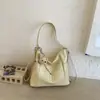 Bolsa de dumplings de gran capacidad para mujer, nuevo diseño de nicho vintage 2026, bolso de hombro cruzado, mochila multifuncional