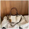 Bolso de Cubo de Mano Casual Simple Shuai Mi Jia para Mujer, Moda Otoño 2026, Estilo Occidental y Bolso Cruzado de Calidad para el Trabajo