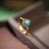 Plata de ley S925 chapada en oro incrustada jade azul natural calidad A garra de cuatro puntas simple unos pocos fideos de huevo pequeños estilo antiguo exquisito