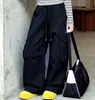 Conjunto de otoño para niñas 2026 nuevo modelo conjunto de dos piezas de imitación con top de retazos a rayas y pantalones cargo para niños venta al por mayor