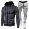 Nuevo conjunto de cremallera de color sólido con estampado de lunares estilo europeo y americano, que incluye una sudadera con capucha unisex forrada de polar y pantalones de chándal para otoño e invierno