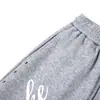 Calça de moletom estampada floral cruzada solta de perna larga para homens, vibe hip-hop moda de rua, calças de corte reto com design único