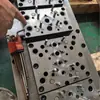 Fábrica de Moldes de Ferretería Zhongshan Diseña y Desarrolla Moldes de Estampado Continuo Automático, Moldes Progresivos, Moldes de Transferencia y Estirado, y Fabricación