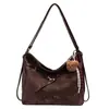 Bolso vintage de gran capacidad para mujer, nuevo modelo otoño e invierno 2026, mochila súper popular para el día a día, bolso de hombro moderno y versátil de múltiples usos
