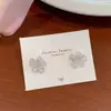 Pendientes de Flor y Lazo de Zirconia para Mujer, Púa de Plata, Súper Hada y Dulces de Cobre Microincrustados Nicho Lujo Accesible Gama Alta Versátiles