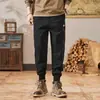Novas calças jogger casuais afuniladas de caimento solto para outono e inverno, calças cargo de nove pontos, calças esportivas estilo harém masculinas em preto